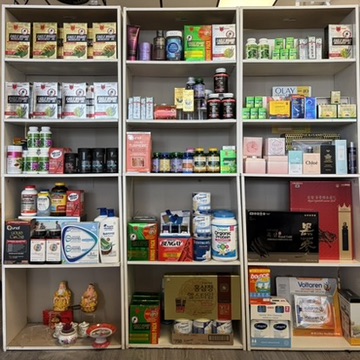 Shelves of vitamins, health products, and cosmetics in the store